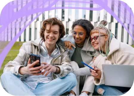 Three students are posing for a selfie together.