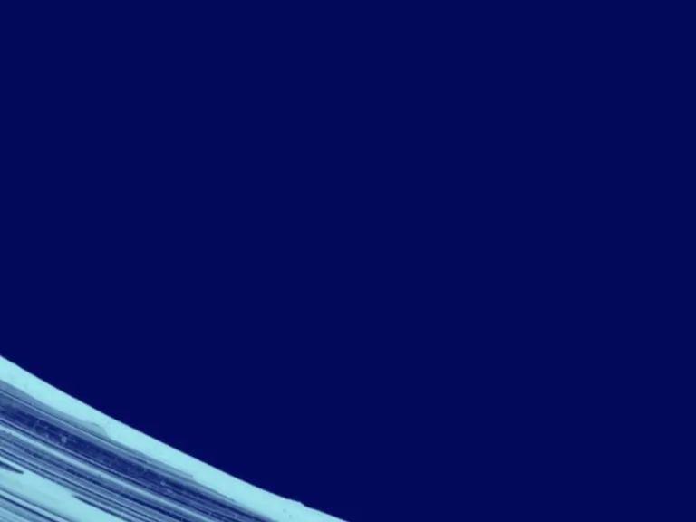 Navy background with a light blue brushstroke along the lower left edge.