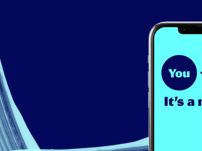 Smartphone screen displaying a Lüm Mobile graphic that reads, “You + Lüm Mobile = It’s a match!"
